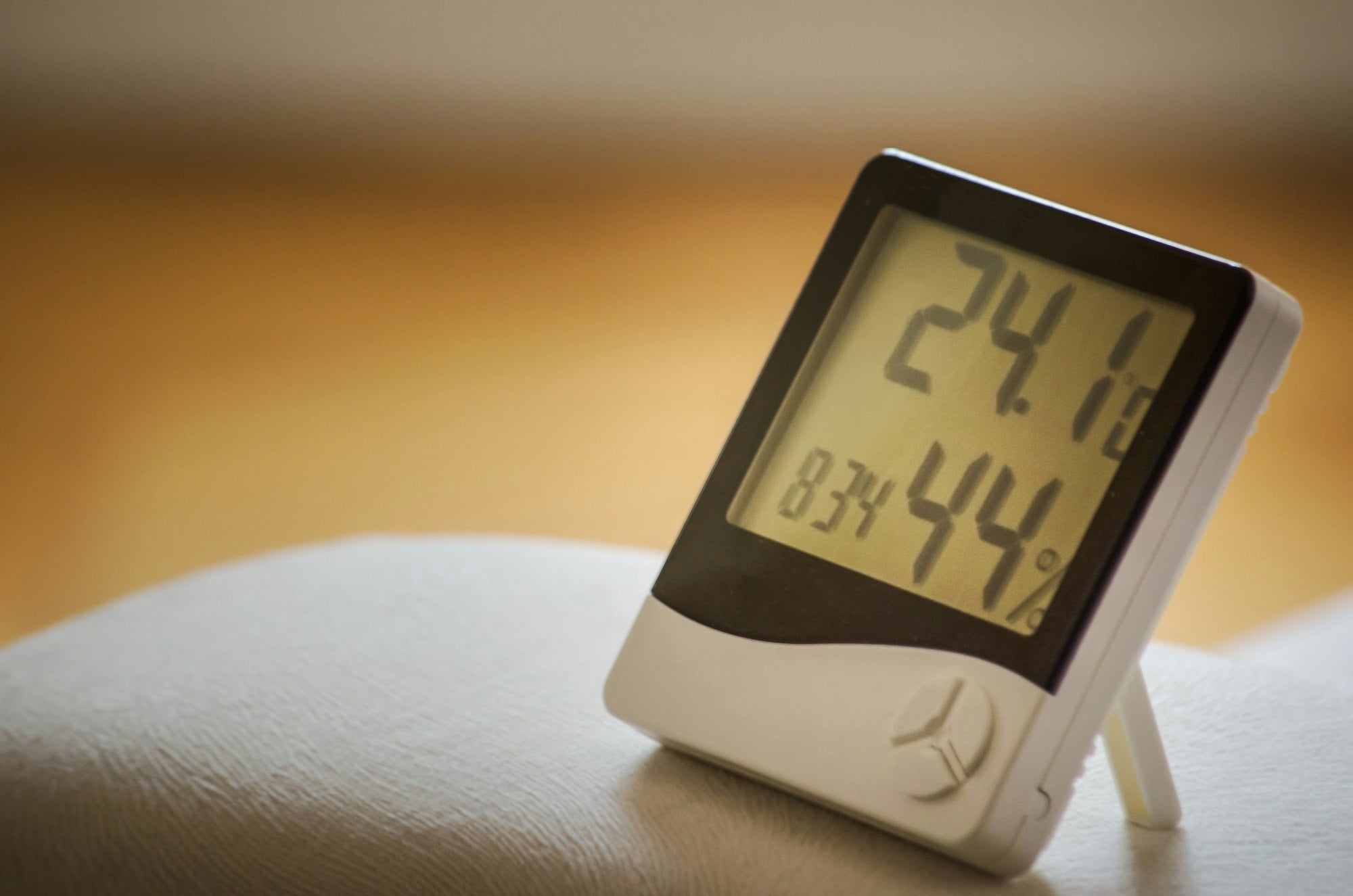 Digital hygrometer reading 44% relative humidity